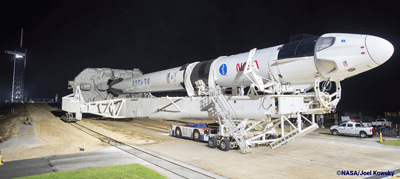 Crew Dragon spacecraft on the SpaceX Falcon 9 rocket as it is rolled out to Launch Complex 39A for the Crew-1 mission